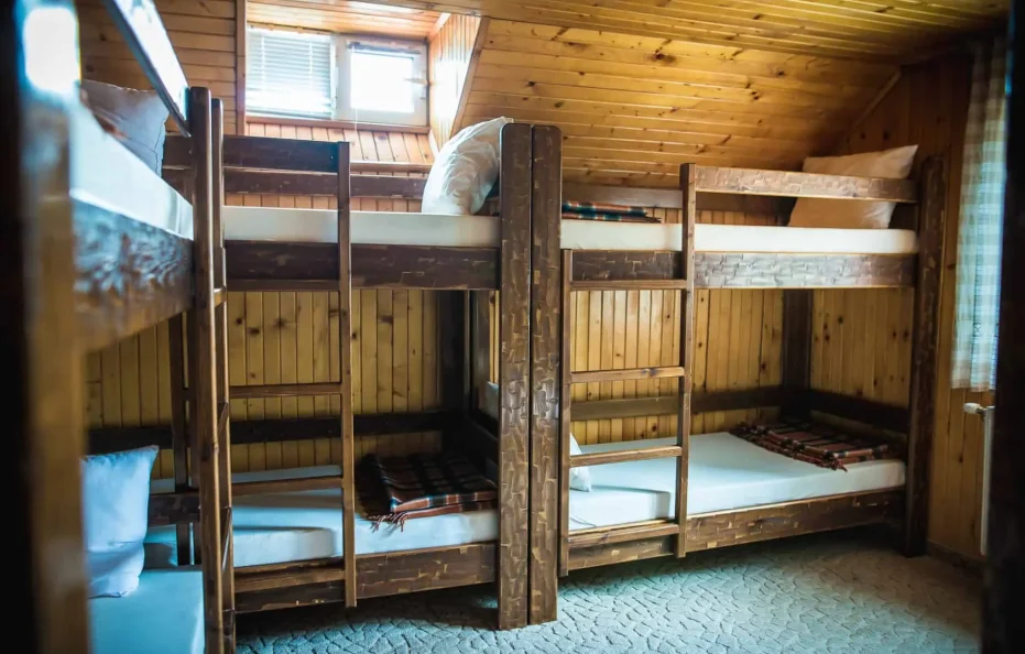 Dobrila hut rooms with 6, 8, and 10 beds